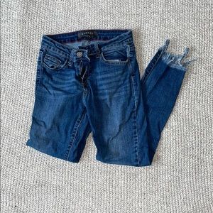 Distressed ankle jeans